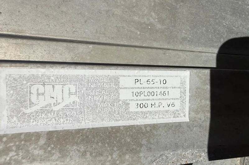 Slide: The Image of Label on Glasstream 273 SCX 2003 boat, showing model PL-65-10, serial 10PL001461, 300 HP V6. - 128
