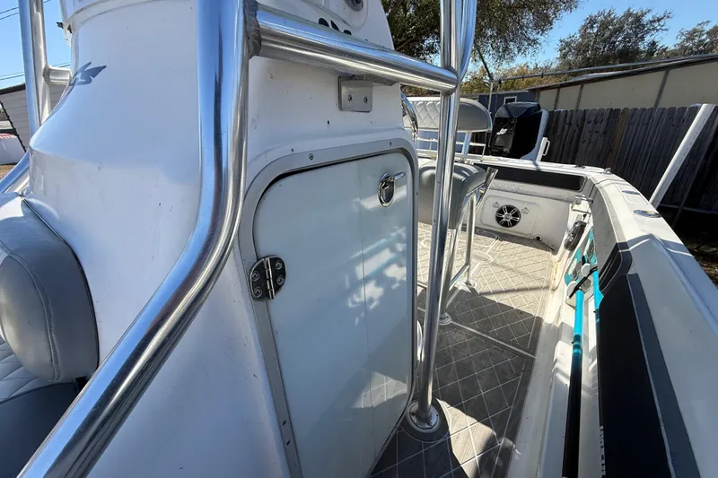 Slide: The Image of 2003 Glasstream 273 SCX boat interior with stainless steel railings and seating. - 70