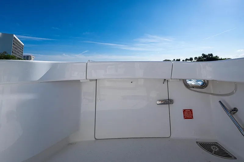 Slide: The Image of 2023 Viking 48 Sport Tower yacht deck with clear blue sky background. - 31