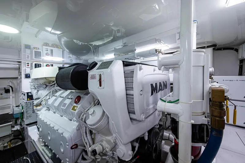 Slide: The Image of Engine room of 2023 Viking 48 Sport Tower with MAN engine components. - 48