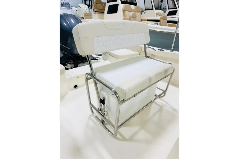 Slide: The Image of 2026 Scout 188 Sportfish boat seat with stainless steel frame and white cushioned upholstery. - 8