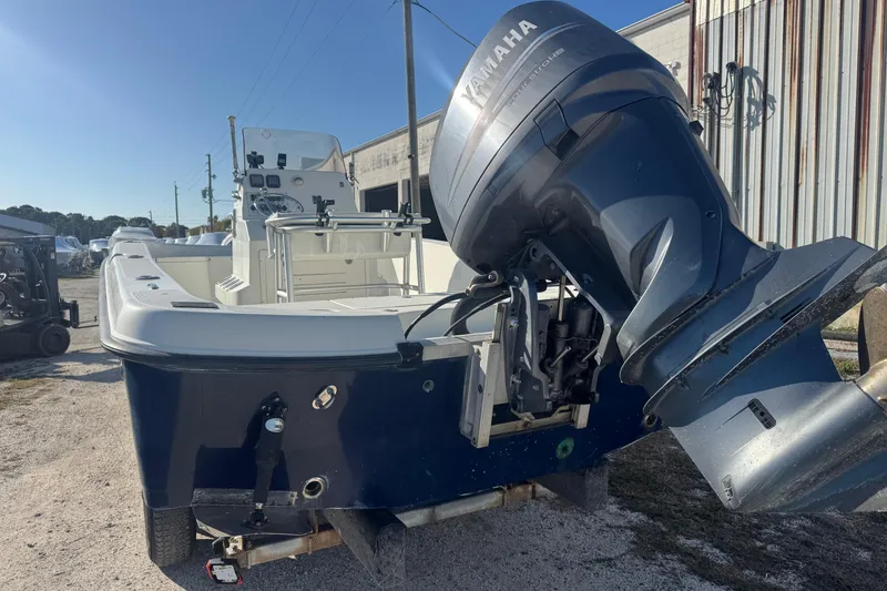 Slide: The Image of 2008 Hydra-Sports 2300 CC boat with Yamaha outboard motor, parked outdoors. - 10