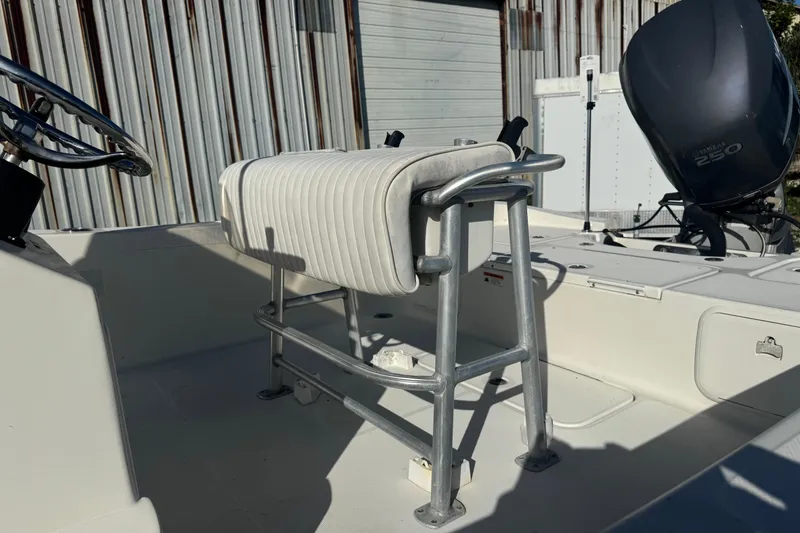 Slide: The Image of 2008 Hydra-Sports 2300 CC boat interior with seating and Yamaha 250 engine. - 2