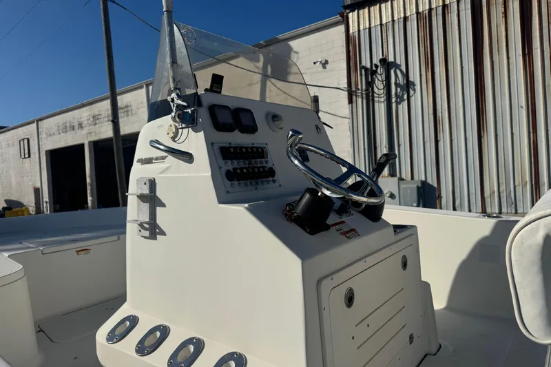 Slide: The Image of 2008 Hydra-Sports 2300 CC boat console with steering wheel and controls. - 3