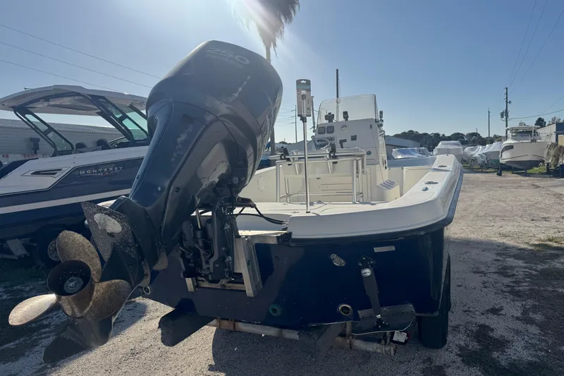 Slide: The Image of 2008 Hydra-Sports 2300 CC boat with powerful outboard motor, parked on a sunny day. - 9