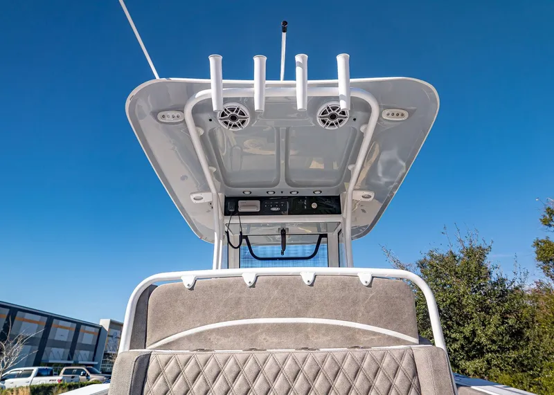 Slide: The Image of Sea Hunt Ultra 275 CB 2026 with T-top and speakers. - 11