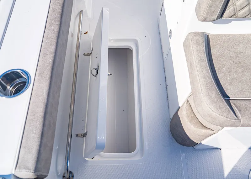Slide: The Image of Storage compartment in Sea Hunt Ultra 275 CB boat, 2026 model. - 14