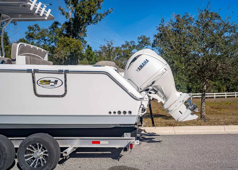 Slide: The Image of Sea Hunt Ultra 275 CB 2026 with Yamaha engine on trailer. - 3