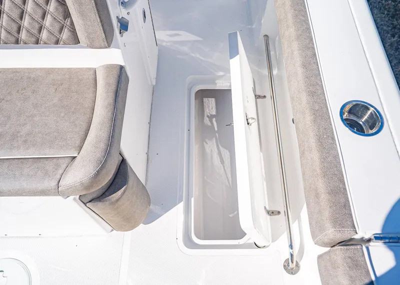 Slide: The Image of Interior of Sea Hunt Ultra 275 CB 2026 with seating cushions. - 13