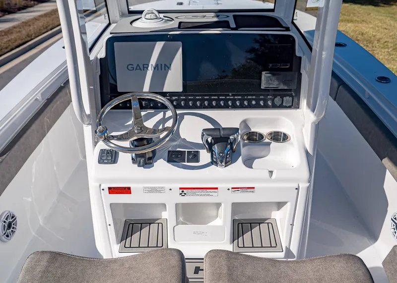 Slide: The Image of Sea Hunt Ultra 275 CB 2026 helm with Garmin system. - 17