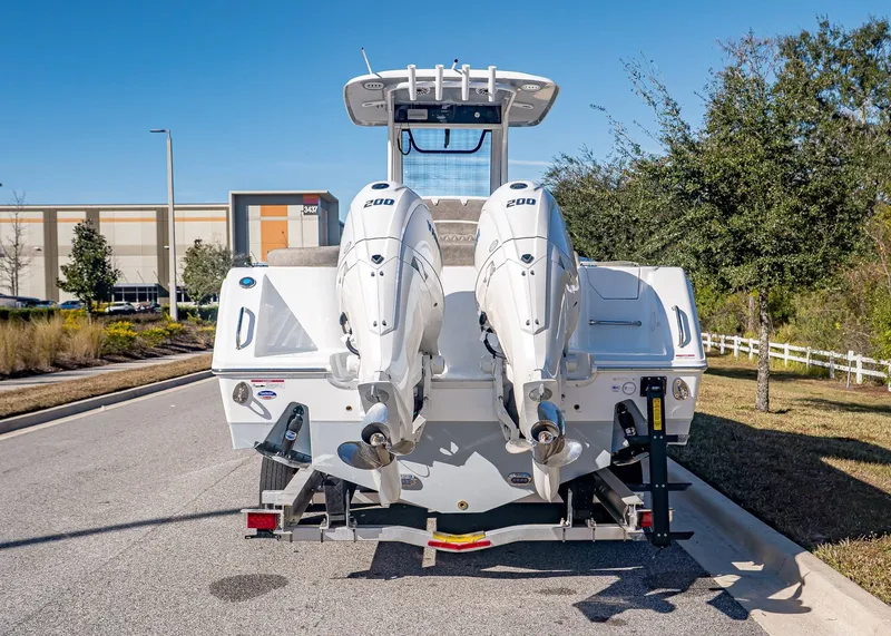 Slide: The Image of Rear view of Sea Hunt Ultra 275 CB boat, year 2026. - 4