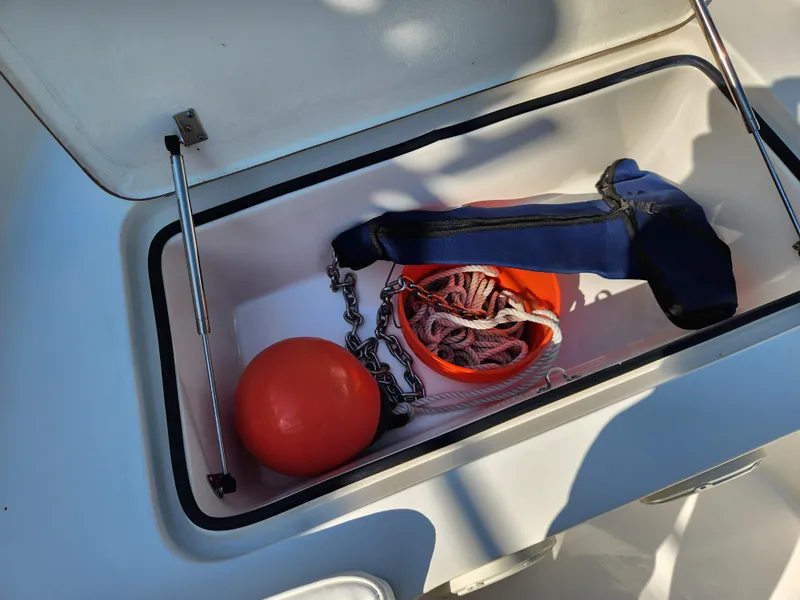 Slide: The Image of 2014 Islamorada Boatworks Morada 24 dashboard with navigation system and controls. - 14