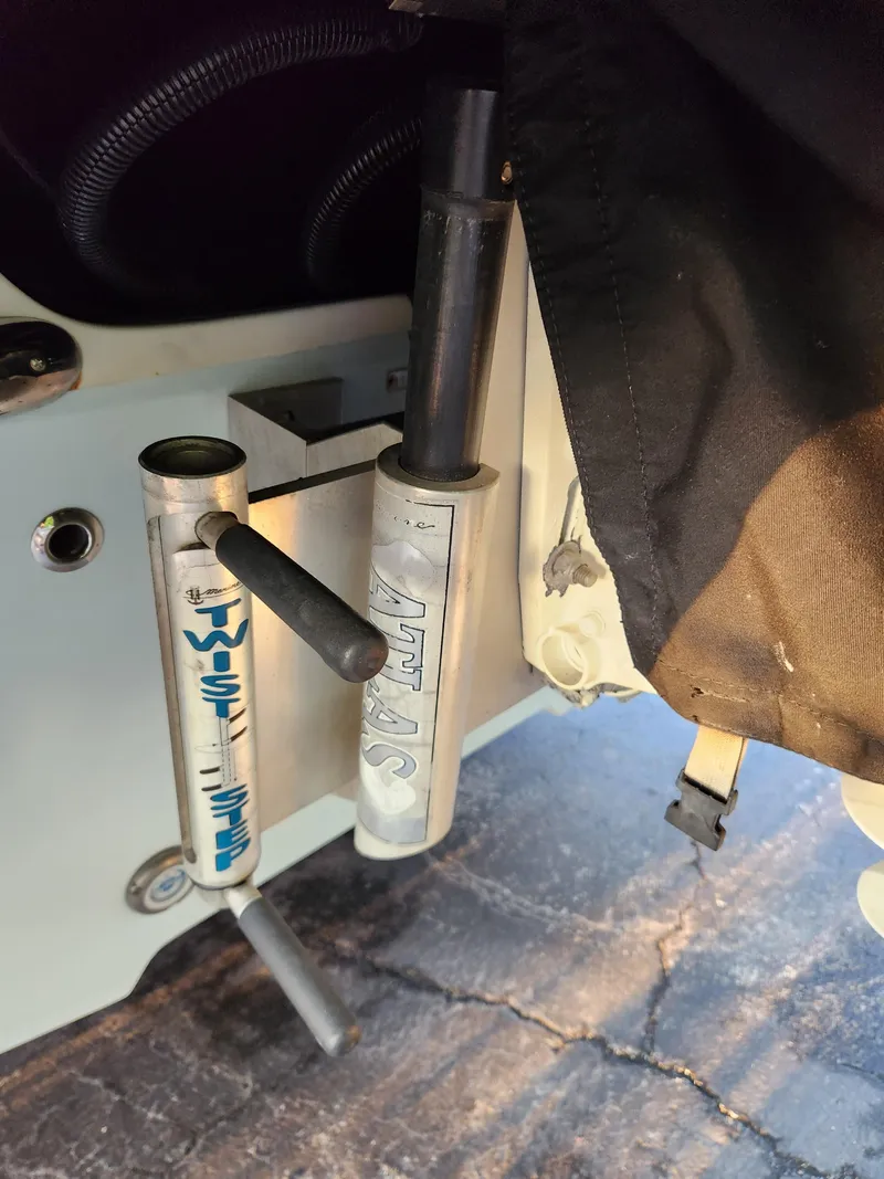 Slide: The Image of Interior view of 2014 Islamorada Boatworks Morada 24, featuring a window and latch mechanism. - 17