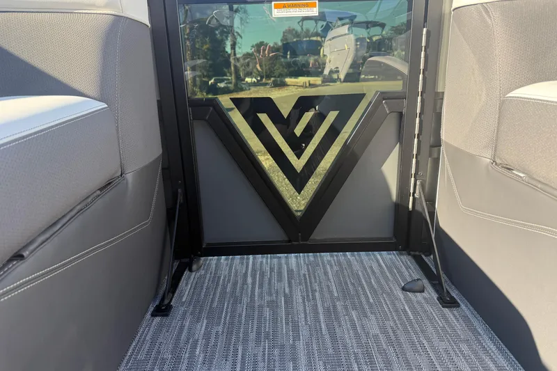 Slide: The Image of Interior view of 2026 Viaggio Lago Z-S boat with stylish seating and logo design. - 10