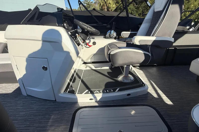 Slide: The Image of Interior of 2026 Viaggio Lago Z-S boat, featuring modern helm and seating. - 13