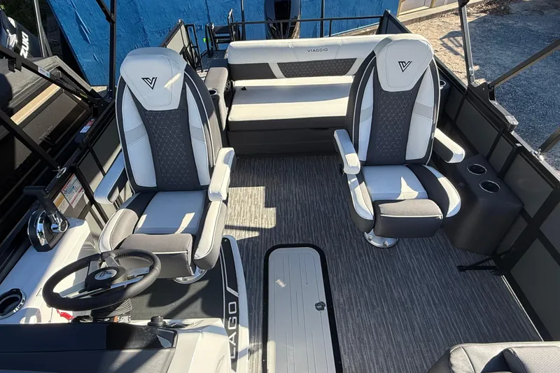 Slide: The Image of 2026 Viaggio Lago Z-S boat interior with modern seating and steering wheel. - 4
