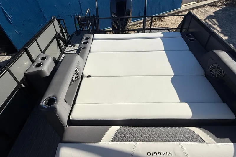 Slide: The Image of Luxurious seating area on 2026 Viaggio Lago Z-S boat with cup holders and speakers. - 6