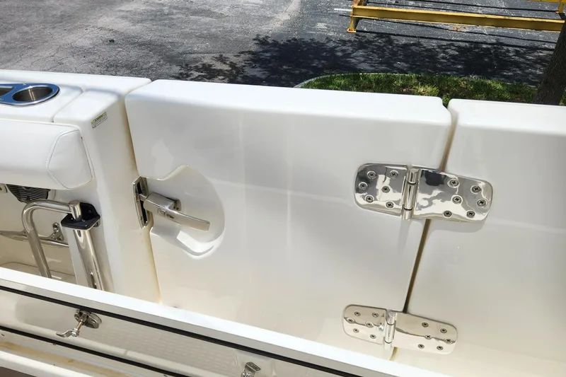 Slide: The Image of 2014 Boston Whaler 350 Outrage boat with stainless steel hinges and latch. - 34