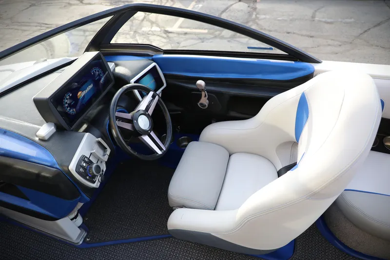 Slide: The Image of 2016 Malibu Wakesetter 20 VTX interior with modern dashboard and steering wheel. - 7