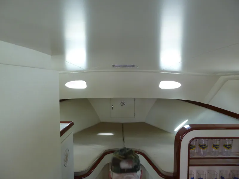 Slide: The Image of Interior of a 1949 Rybovich Sport Fish boat, featuring sleek design and modern lighting. - 44