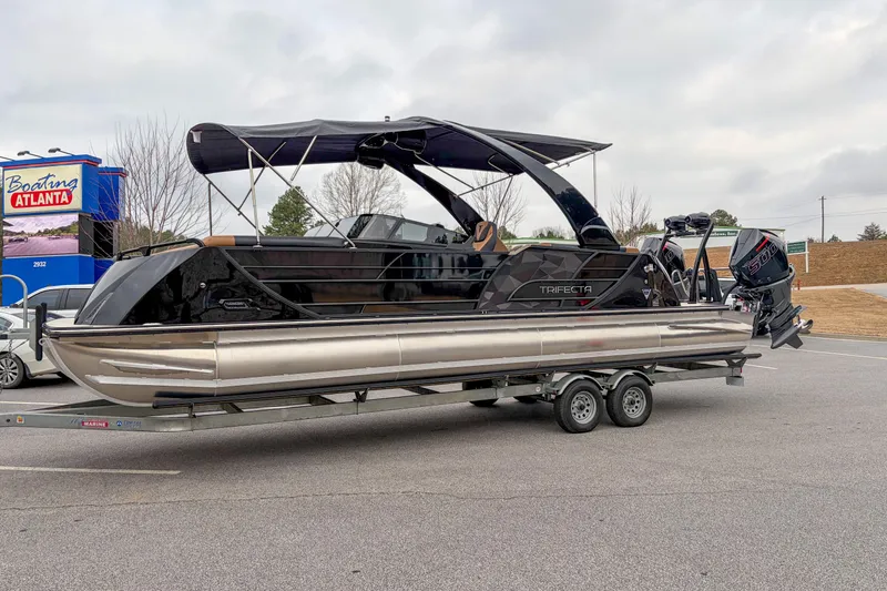 The Image of 2026 Trifecta Sport RF9 DC pontoon boat on trailer at Boating Atlanta dealership. - 1
