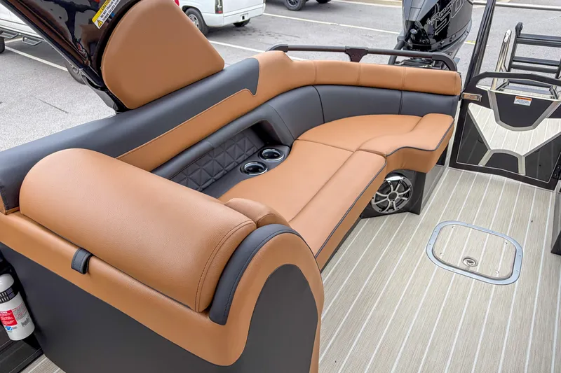 Slide: The Image of Luxurious seating on 2026 Trifecta Sport RF9 DC boat with tan and black upholstery. - 12