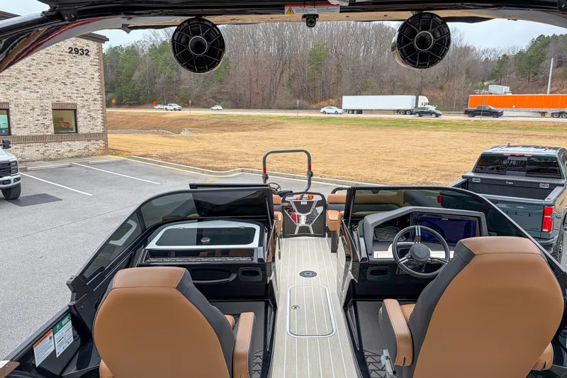 Slide: The Image of 2026 Trifecta Sport RF9 DC boat interior with modern dashboard and seating. - 15