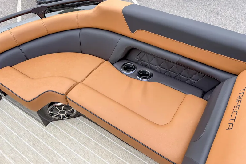 Slide: The Image of Luxurious seating in 2026 Trifecta Sport RF9 DC boat with cup holders and premium upholstery. - 5