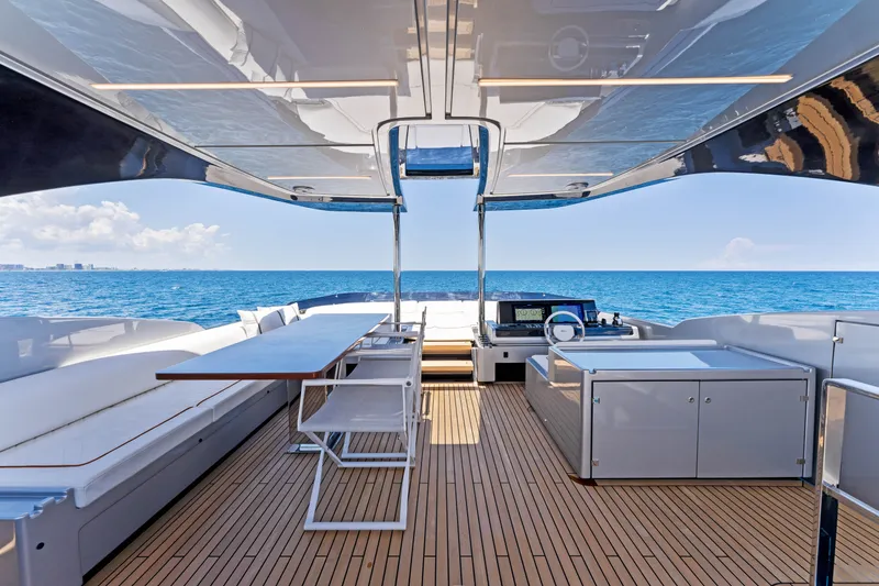 Slide: The Image of Luxurious deck of Riva 82' Diva yacht, 2027 model, with ocean view. - 27