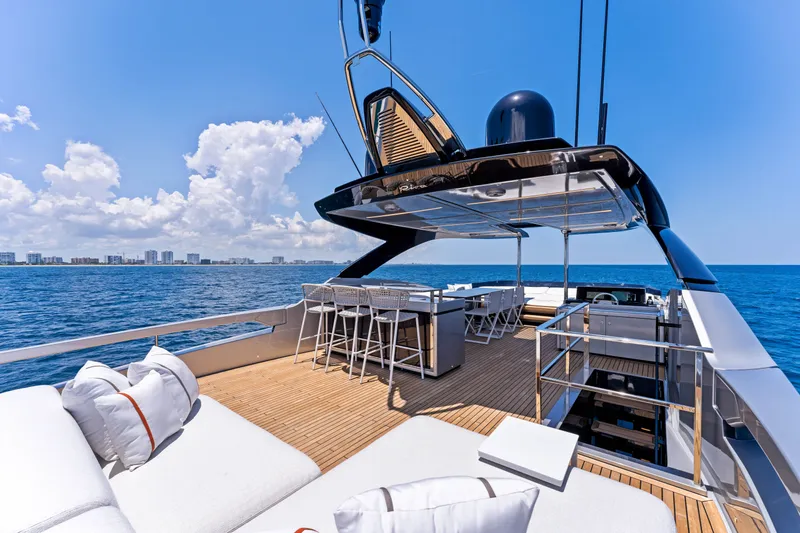 Slide: The Image of Luxury yacht Riva 82' Diva 2027 on open sea, sunny deck. - 33