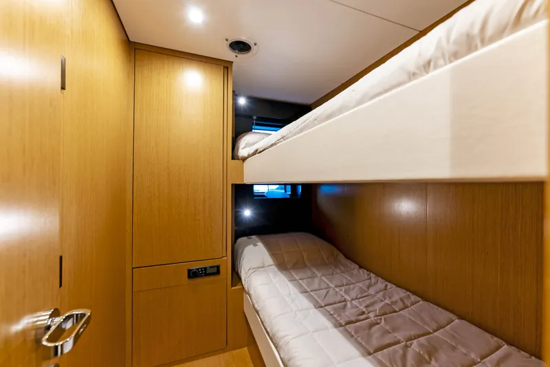 Slide: The Image of Interior of Riva 82' Diva 2027 with bunk beds. - 43
