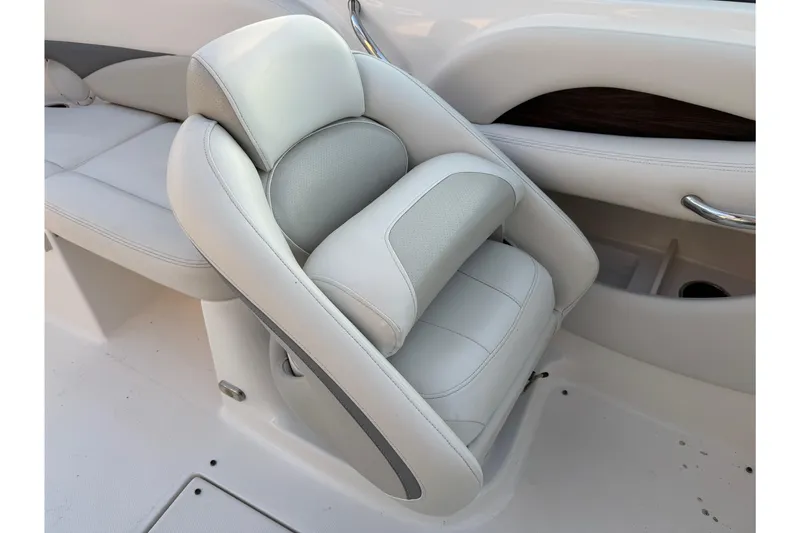 Slide: The Image of Luxury seating in a 2007 Chaparral 256 SSi boat, featuring plush white upholstery. - 17