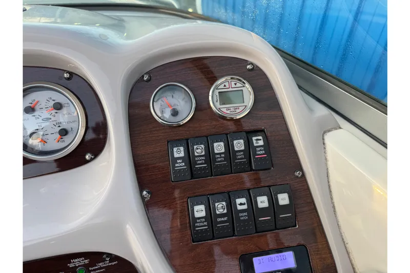 Slide: The Image of Dashboard of 2007 Chaparral 256 SSi boat with gauges and control switches. - 30