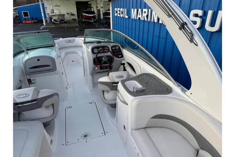 Slide: The Image of 2007 Chaparral 256 SSi boat interior with steering wheel and seating. - 37