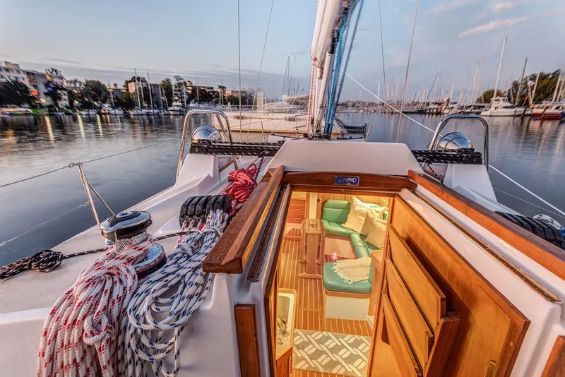 Slide: The Image of Manufacturer Provided Image: Sailboat Tartan 365, 2026 model, docked with open cabin view, cozy interior. - 3