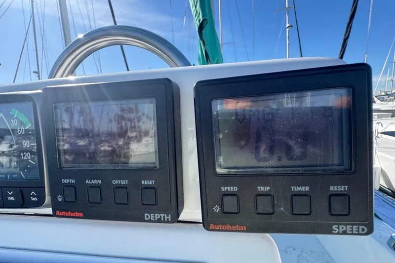 Slide: The Image of Autopilot and speed instruments on a 1997 Catalina 36 MkII sailboat dashboard. - 11