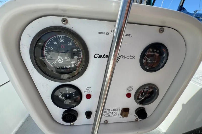 Slide: The Image of Instrument panel of a 1997 Catalina 36 MkII yacht with gauges and controls. - 12