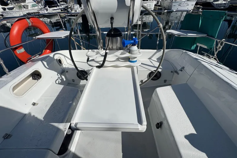 Slide: The Image of Cockpit of 1997 Catalina 36 MkII sailboat with steering wheel and safety equipment. - 16