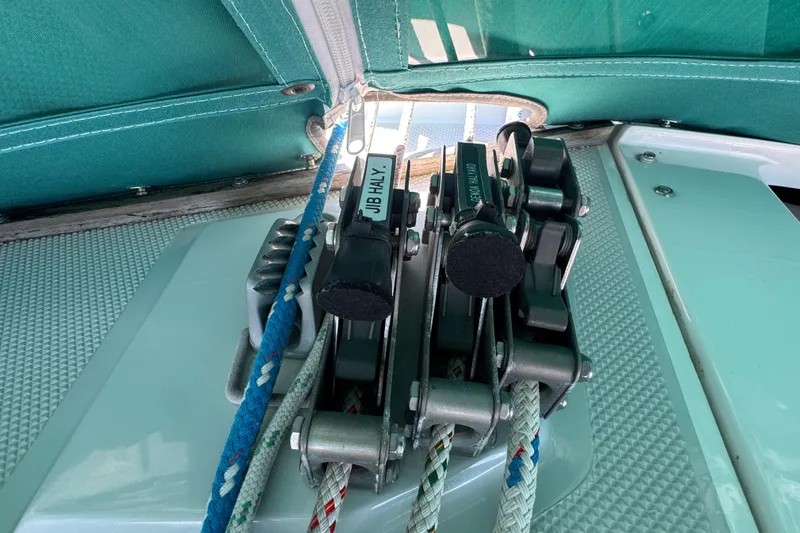 Slide: The Image of Close-up of Catalina 36 MkII 1997 sailboat rigging and ropes under green canopy. - 19