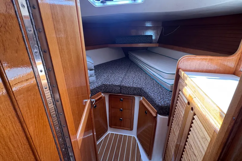 Slide: The Image of Cozy cabin interior of 1997 Catalina 36 MkII sailboat with wooden finishes. - 41