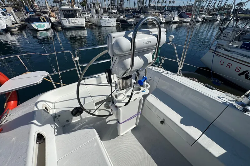 Slide: The Image of Cockpit of a 1997 Catalina 36 MkII sailboat docked in a marina. - 6