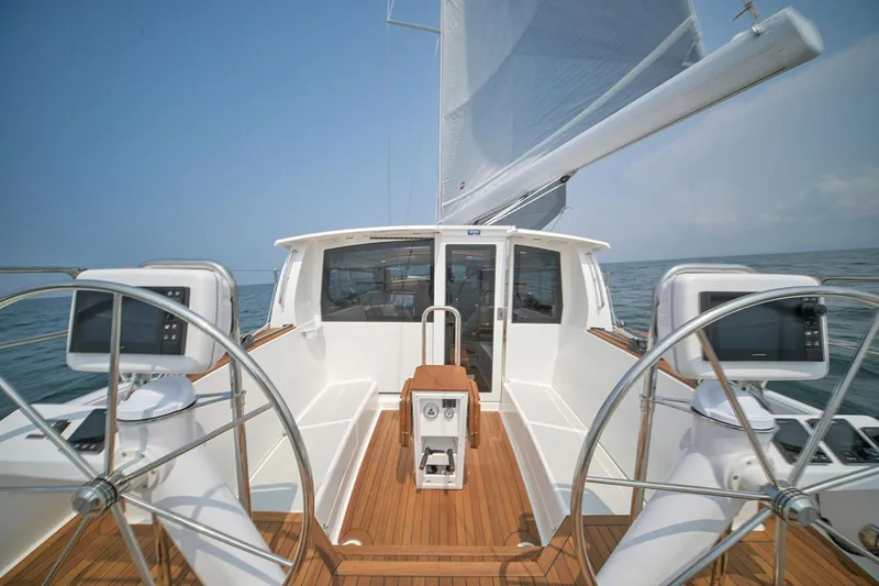 Slide: The Image of Manufacturer Provided Image: Sailing yacht Tartan 455, 2026 model, with dual steering wheels and sleek deck design. - 3