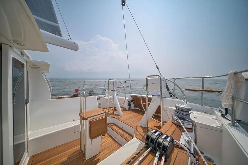 Slide: The Image of Manufacturer Provided Image: Modern Tartan 455 yacht deck, 2026 model, with sleek design and ocean view. - 4