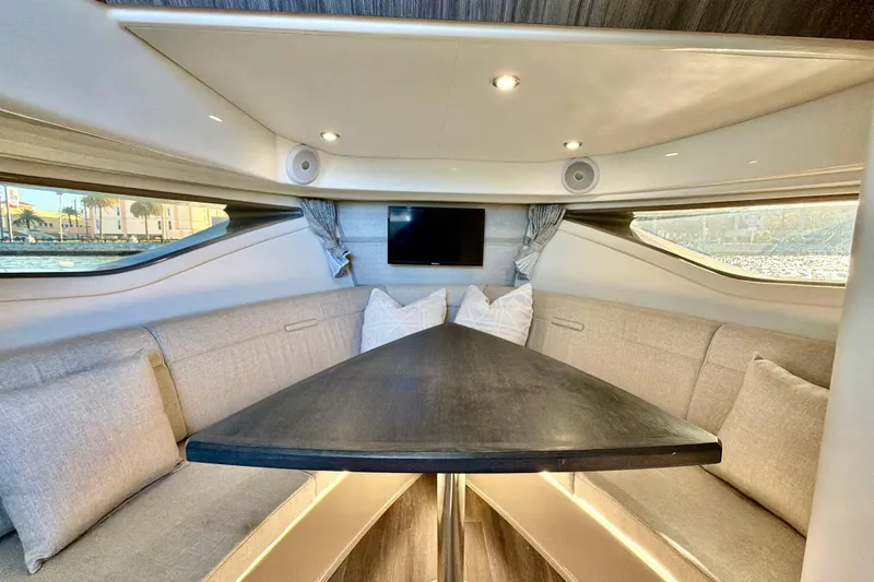 Slide: The Image of Luxurious interior of 2022 Sea Ray Sundancer 320 yacht with elegant seating and modern amenities. - 10