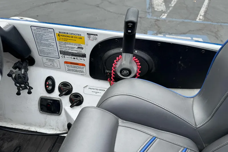 Slide: The Image of Interior of a 2022 Nitro Z20 Pro boat showing controls and seating. - 19
