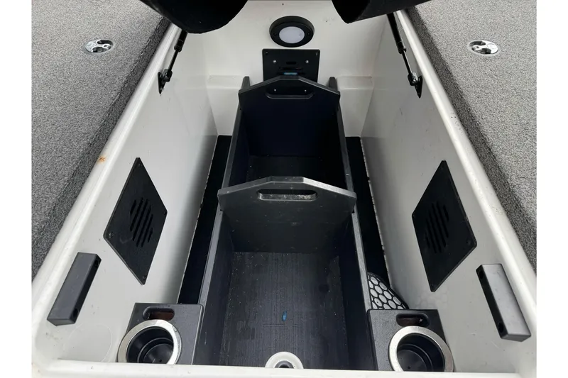 Slide: The Image of Interior storage compartment of 2022 Nitro Z20 Pro boat, featuring organized sections. - 23