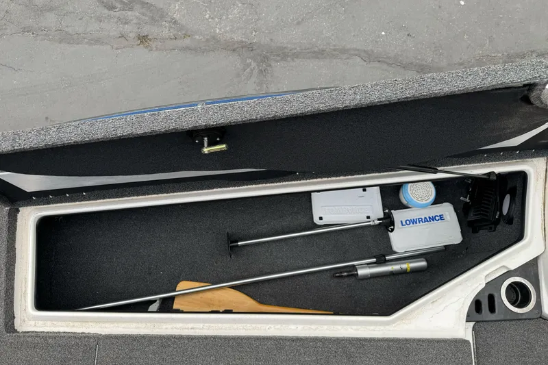Slide: The Image of Storage compartment in a 2022 Nitro Z20 Pro boat with Lowrance equipment. - 25
