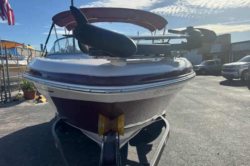 Slide: The Image of 2008 Tahoe Q6 SF boat on trailer in sunny outdoor setting. - 3