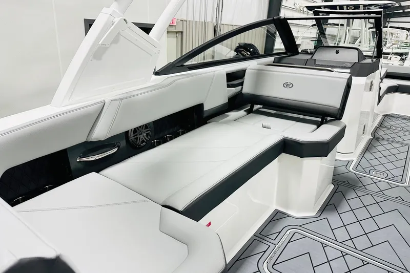 Slide: The Image of 2026 Cobalt R6 Outboard interior with sleek white and black seating and modern design. - 10
