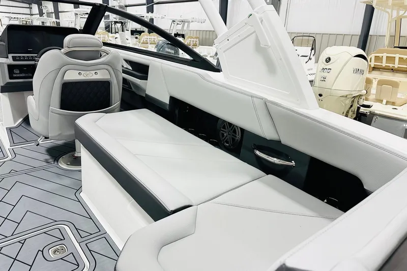 Slide: The Image of Luxurious interior of 2026 Cobalt R6 Outboard boat with sleek seating and modern design. - 11